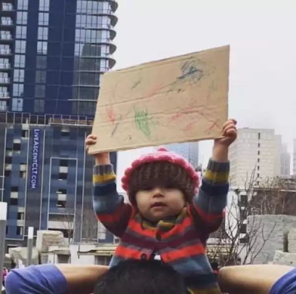 Check out this cute baby at the women march